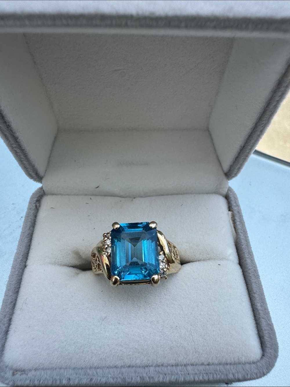 Gold Ring with Emerald-Cut Blue Topaz and Diamond Accents
